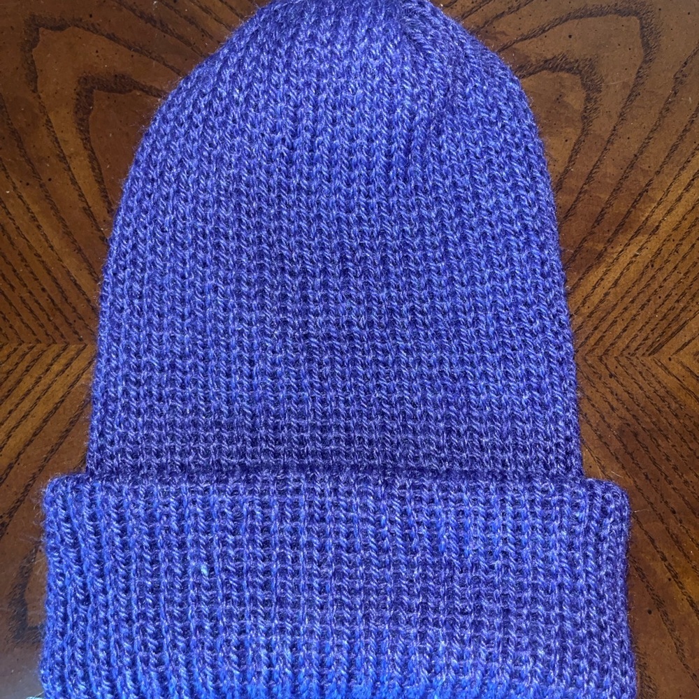Handmade knit purple beanie
Made from recycled plastic